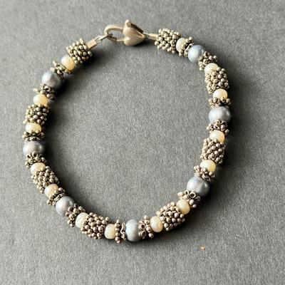 Beautiful silver tone pearl bracelet