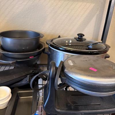 Sale Photo Thumbnail #26: Crock pot baking pans, Ninja Blender and more.