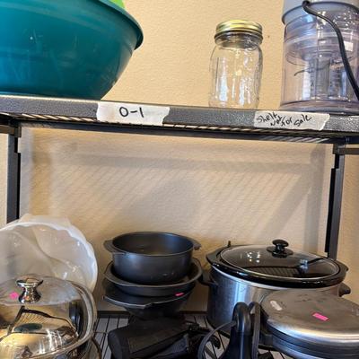 Sale Photo Thumbnail #25: Crock pot baking pans, Ninja Blender and more.