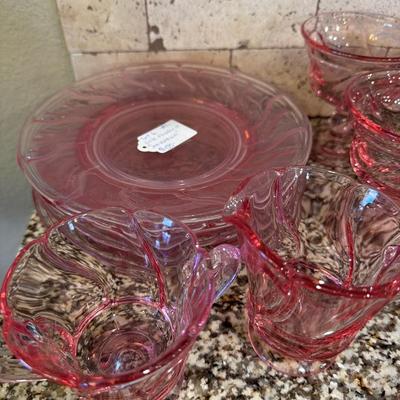 Sale Photo Thumbnail #43: Pink Fostoria  1966 
6 plates, 5 footed glasses, 5 glasses,
 5 small champagne glasses