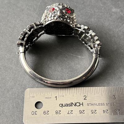 Silver tone rhinestone owl hinged bracelet with red ruby eyes
