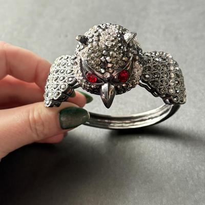 Silver tone rhinestone owl hinged bracelet with red ruby eyes