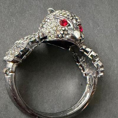 Silver tone rhinestone owl hinged bracelet with red ruby eyes