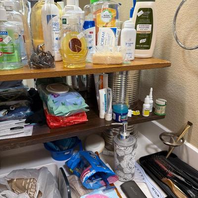 Sale Photo Thumbnail #125: Hamper, Wigs, Glasses and bathroom items.