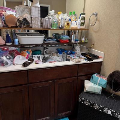 Sale Photo Thumbnail #124: Hamper, Wigs, Glasses and bathroom items.