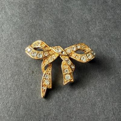 Monet marked gold tone rhinestone bow pin