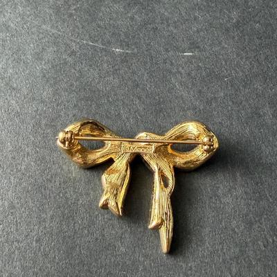 Monet marked gold tone rhinestone bow pin