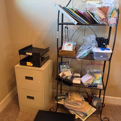 Sale Photo Thumbnail #144: Printer, Office supplies, file cabinet,and more.

Bakers rack not included.