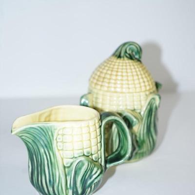 Sale Photo Thumbnail #197: perfect for the kitchen use for something else if you dont want to use for sugar and creamer, 
Nice to have that extra holder for teaspoons or measure spoons. 
Or.. a cheerful decorative . 
Height of the sugar : 7" 
Height of the creamer: 4:
good conditio