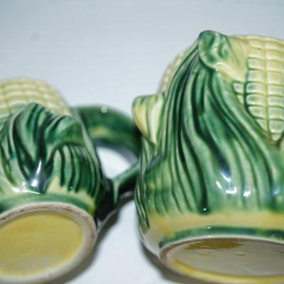 Sale Photo Thumbnail #202: perfect for the kitchen use for something else if you dont want to use for sugar and creamer, 
Nice to have that extra holder for teaspoons or measure spoons. 
Or.. a cheerful decorative . 
Height of the sugar : 7" 
Height of the creamer: 4:
good conditio