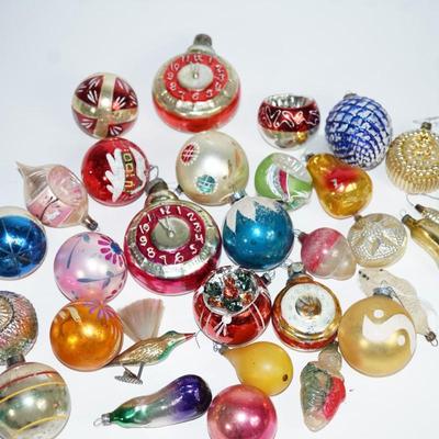 Sale Photo Thumbnail #203: 30 vintage Christmas ornaments. 
Most have paint missing and or a few have the metal top missing. 
Overall in the condition based on age and use they are good. A few may need a little repair as the spun glass wings and tails may need to be reapplied.