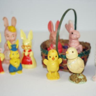 Sale Photo Thumbnail #218: grouping of plastic rabbits 6", 5" and 3" 
plastic little yellow chick at 3" 
two paper machine rabbits vintage 6" and 5"  -chips.   areas of missing paint. see photo 
the little basket is a vintage hand woven basket. measures about 7" in height good cond