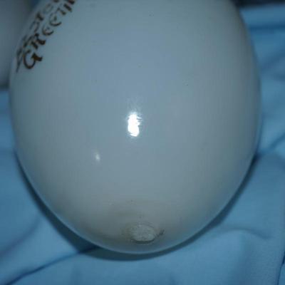 Sale Photo Thumbnail #226: original antique wire collecting basket. 
Four various sizes of milkglass decorated hand blown eggs. 
The paint is partially off on some of the eggs but still have the charm of a craft of the early 20th century 
The wire basket is 8"in height with out the