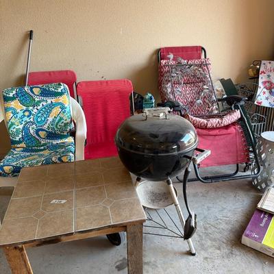 Sale Photo Thumbnail #185: Grill, Outdoor Yard Art, and Chairs.