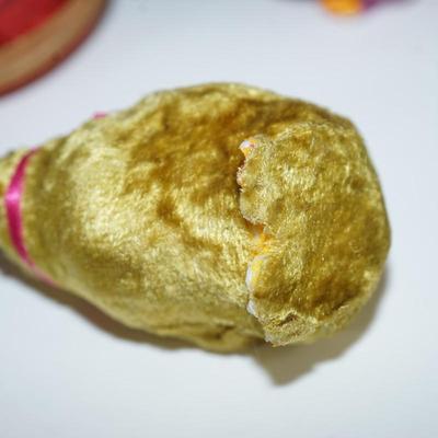 Sale Photo Thumbnail #237: three  chicks covered with a felt fabric , very soft, silk florals and ribbon . little black bead eyes.  and decorated with ribbon and other. The base is a hard white plastic. 
1940- 1950's? 
felt is missing on a few of the feet. two of the beaks have a l