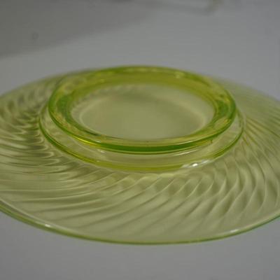 Sale Photo Thumbnail #244: possible Anchor Hocking Swirl pattern
8" 
vaseline glass 
set of eight
good condition. No cracks or chip. the glass is clear 
UV fluorescent