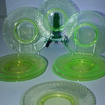 Sale Photo Thumbnail #240: possible Anchor Hocking Swirl pattern
8" 
vaseline glass 
set of eight
good condition. No cracks or chip. the glass is clear 
UV fluorescent