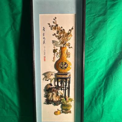 Sale Photo Thumbnail #18: Framed Chinese embroidery artwork depicting a still life scene with a yellow vase, flowers, and other decorative elements on a stand. The piece is housed in a wooden frame with a glass front and features Chinese characters and a signature on the side. Dim