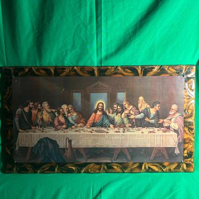 Sale Photo Thumbnail #111: Rectangular wooden plaque featuring a printed reproduction of The Last Supper, a famous depiction of Jesus and his disciples. The artwork is bordered by carved and painted motifs in gold and brown. Shows wear consistent with age and handling. Dimensions a
