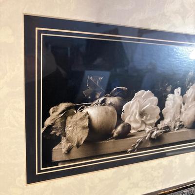 Sale Photo Thumbnail #277: Beautiful rectangle frame measuring 42.5“ x 19“. Art displays floral and fruit. with dark background and light features.