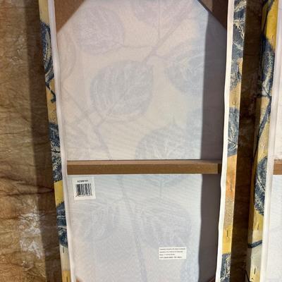 Sale Photo Thumbnail #305: Background of yellow with tree theme on this five piece set of canvas art.  Small pieces are 11.75 square., Larger 11.5” x 24”