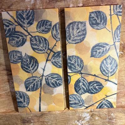 Sale Photo Thumbnail #304: Background of yellow with tree theme on this five piece set of canvas art.  Small pieces are 11.75 square., Larger 11.5” x 24”
