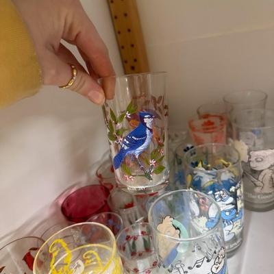 Sale Photo Thumbnail #550: Various glasses, including souvenir E.T. and Alvin and the Chipmunks