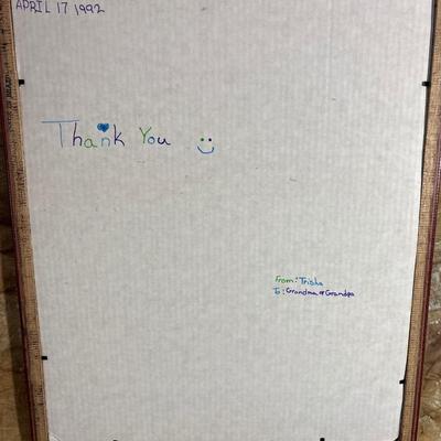 Sale Photo Thumbnail #396: Fun framed crayon artwork with cat chasing butterfly. Frame measures 17 1/2“ x 21 1/2“.