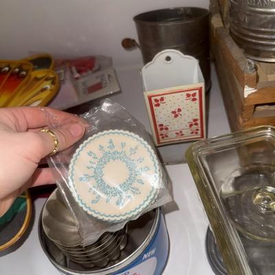 Sale Photo Thumbnail #1023: Egg trays, molds, matchbook holder, etc.