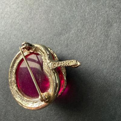 vintage 1972 Sarah Coventry "Burgundy" lucite apple brooch in a gold-tone setting