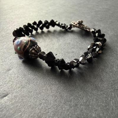 handmade glass and black beaded bracelet with a toggle clasp.