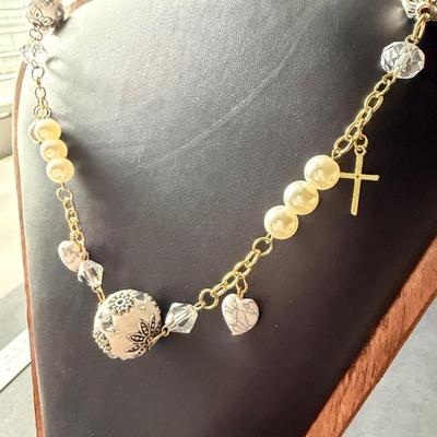 Gold tone heart and cross charms fashion necklace