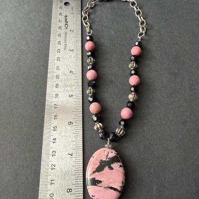 Pink and black beaded stone pendant necklace