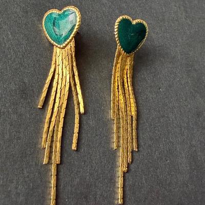Gold tone dangle earrings with green hearts