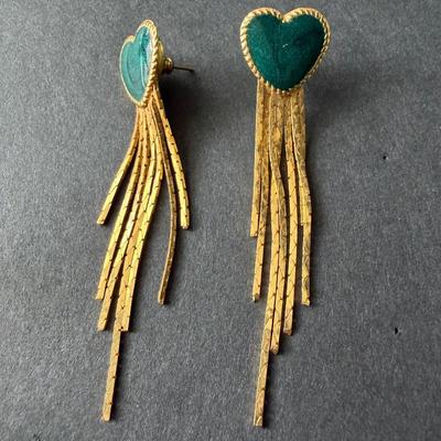 Gold tone dangle earrings with green hearts