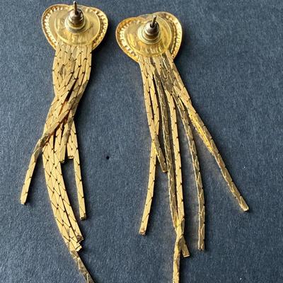 Gold tone dangle earrings with green hearts