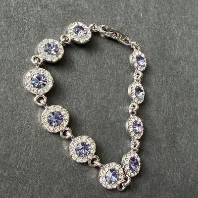 Purple gemstone silver tone rhinestone tennis bracelet