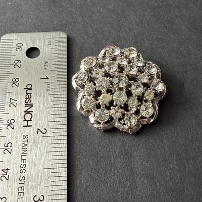 vintage silver-tone rhinestone flower brooch.