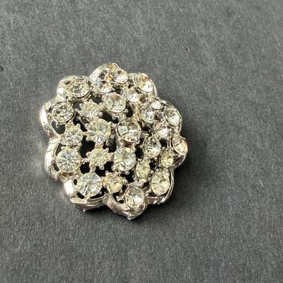 vintage silver-tone rhinestone flower brooch.