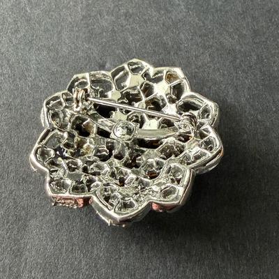 vintage silver-tone rhinestone flower brooch.