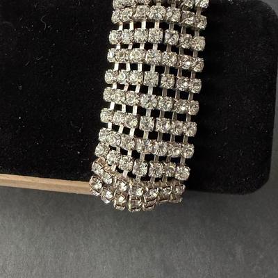 vintage silver-tone rhinestone bracelet with a snap closure