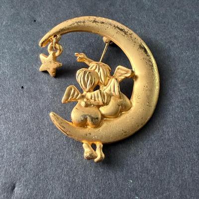 Gold tone vintage moon brooch