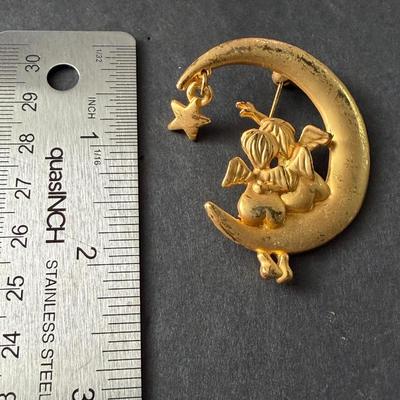Gold tone vintage moon brooch