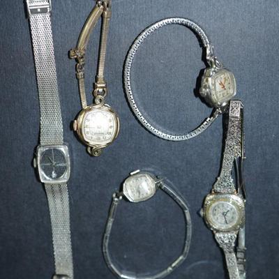 Sale Photo Thumbnail #290: Group of ladies wrist watches. Not working , 
One in 10 kt gold filled case, others are stainless steel or not marked, 
parts or repair