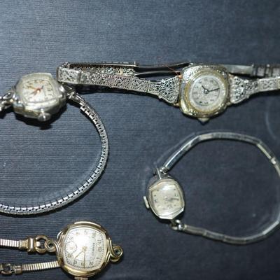 Sale Photo Thumbnail #294: Group of ladies wrist watches. Not working , 
One in 10 kt gold filled case, others are stainless steel or not marked, 
parts or repair
