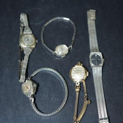 Sale Photo Thumbnail #291: Group of ladies wrist watches. Not working , 
One in 10 kt gold filled case, others are stainless steel or not marked, 
parts or repair