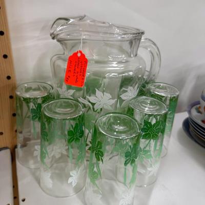 Sale Photo Thumbnail #780: Iridescent grape glasses, green pitcher and glass set