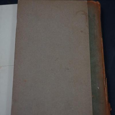 Sale Photo Thumbnail #325: The pages are of thick paper, rough edges , Hard cover with leather spine is very worn and is seperating from the book) most on the lower half , You could put glue on the binding to temporary repair. 
The pages in the inside of the book are bound well and