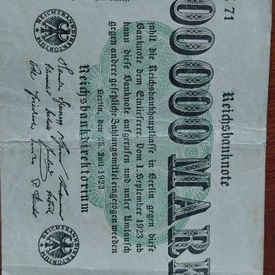 German 100,000 Mark Reichsbanknote issued in Berlin on July 25, 1923, during the Weimar Republic's hyperinflation crisis.