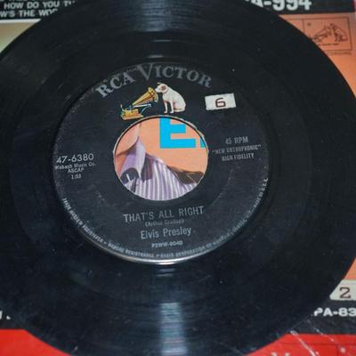 Sale Photo Thumbnail #375: Elvis Presley blue suede shoes,, cardboard sleeve and 45 record. 
Elvis Presley Hound Dog paper sleeve jacket and the 45 record 
Elvis SO Glad Your Mine cardboard sleeve and  =45 record 
two records without the sleeves 45's Thats All right &Elvis Presley 